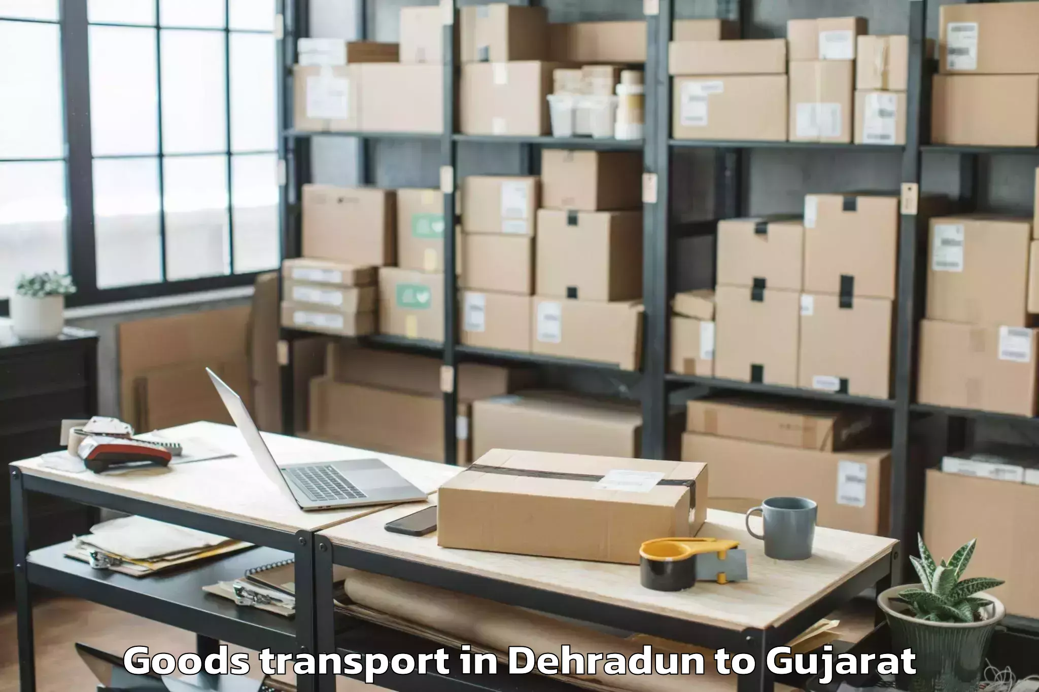 Leading Dehradun to Kamrej Goods Transport Provider